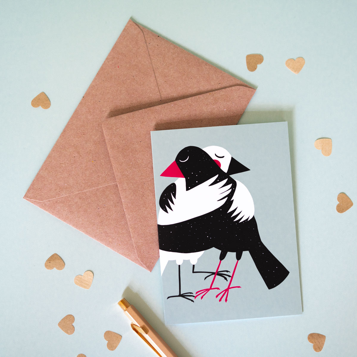 Bird anniversary card showcasing two birds hugging, symbolizing love and togetherness