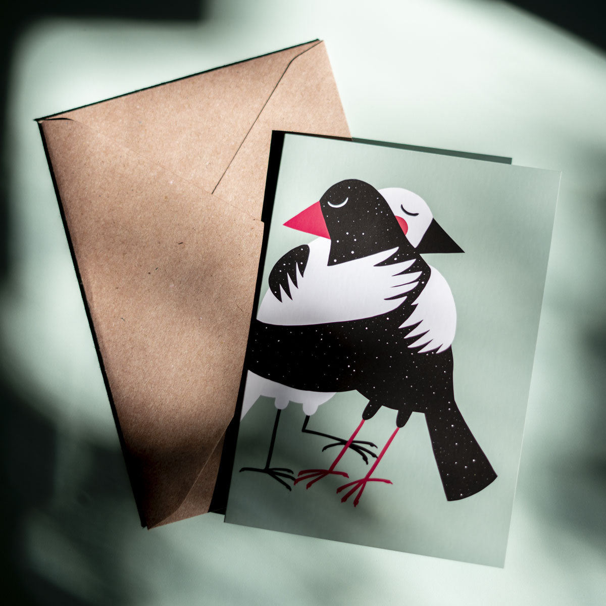 Cute bird card featuring two birds hugging, ideal gift for bird lovers